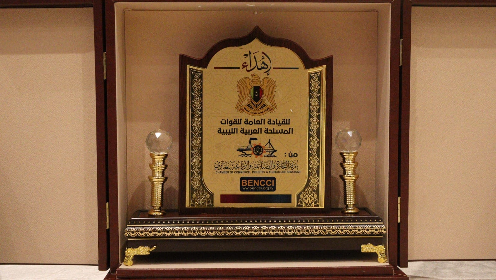 May be an image of ‎grandfather clock and ‎text that says '‎لهُدَاءُ للقيادة العامة للقوات المسلحة العربية الليبية‎'‎‎